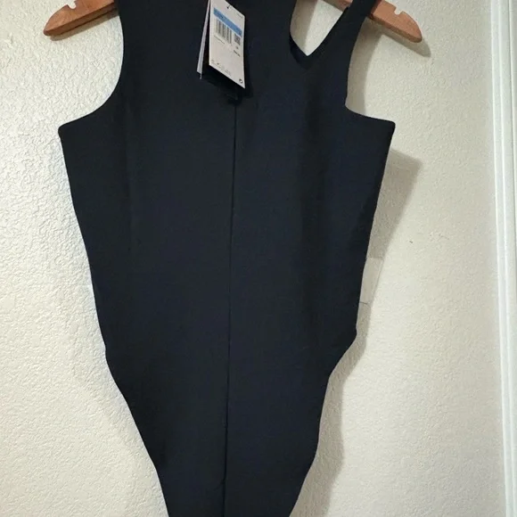 Nike Black Sleeveless Bodysuit NWT
Size M. Cute shoulder cutout detail. Stretchy - Picture 4 of 16